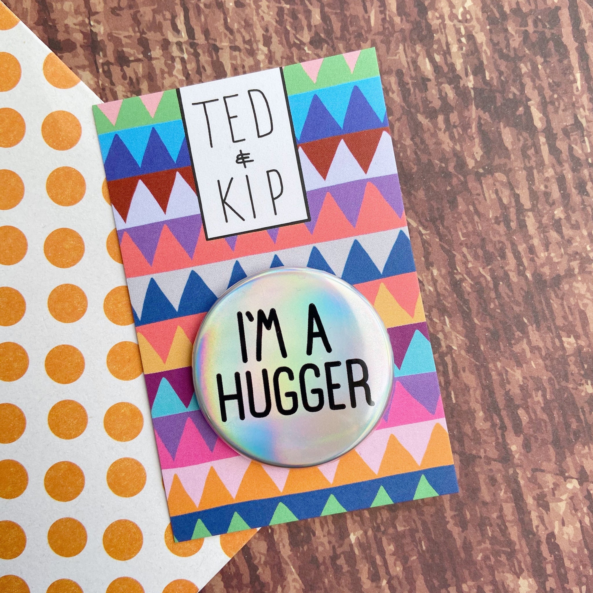 I’m A Hugger Holo Rainbow Button Badge