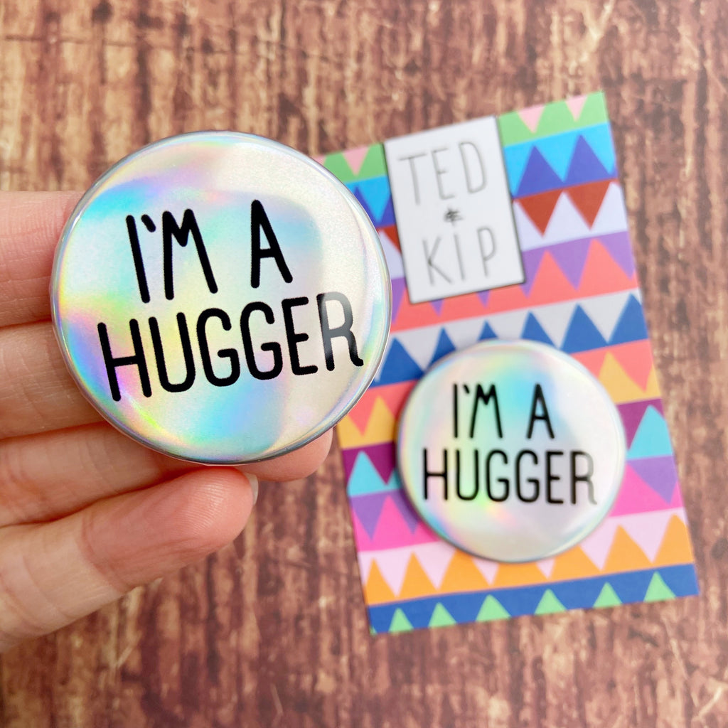 I’m A Hugger Holo Rainbow Button Badge